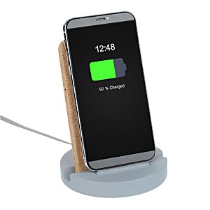 Additional Image 2 - a phone charging on a charging dock