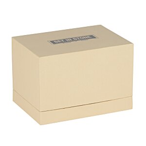 Additional Image 3 - a white box with a black label