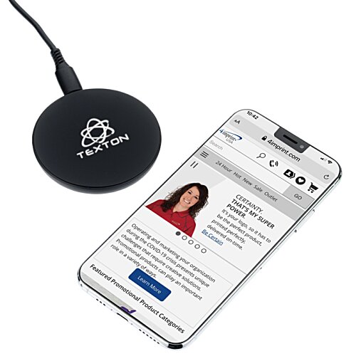 Additional Image 2 - a cell phone next to a wireless charger