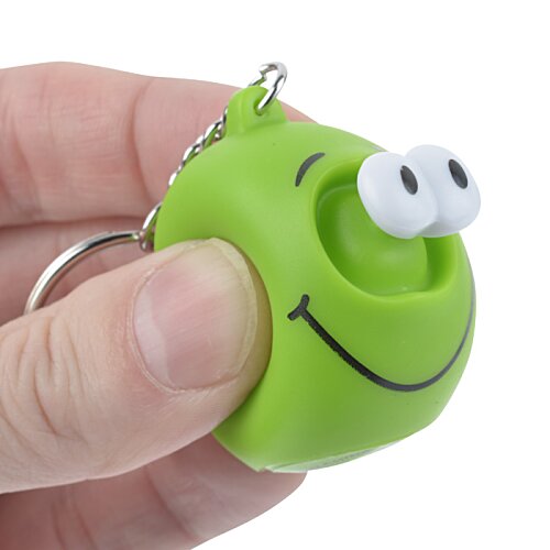 Additional Image 1 - a hand holding a keychain
