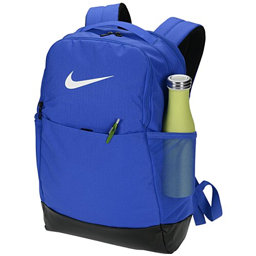 Additional Image 1 - a blue backpack with a bottle in it