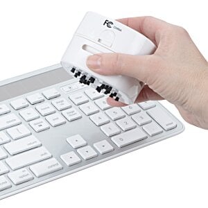 Additional Image 5 - a hand holding a card over a keyboard
