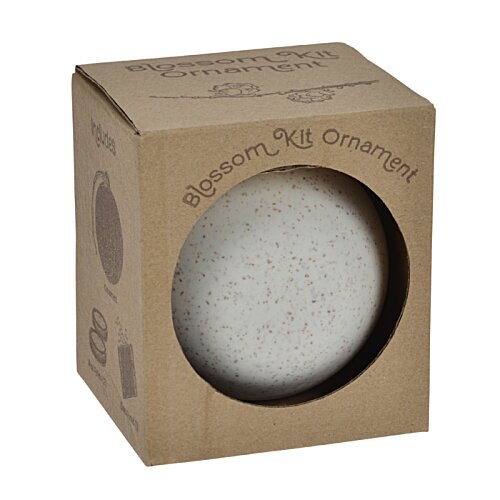 Additional Image 1 - a box with a round object inside