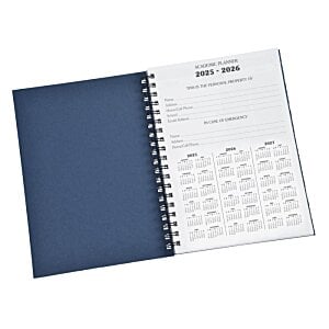 Additional Image 1 - a spiral bound calendar with a blue cover