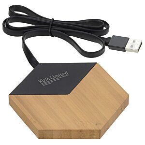 Additional Image 1 - a black and brown hexagon shaped device with a black cord