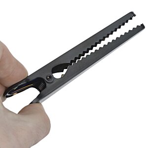 Additional Image 2 - a person holding a clothes pin