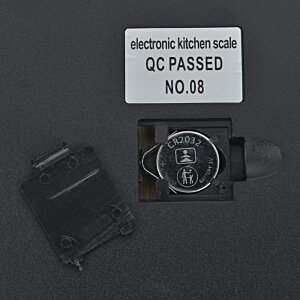 Additional Image 3 - a black rectangular object with a white label