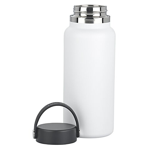 Additional Image 1 - a white bottle with a black lid