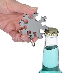 Additional Image 3 - a hand holding a puzzle piece over a bottle of liquid