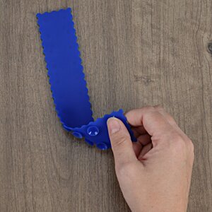 Additional Image 3 - a hand holding a blue tape