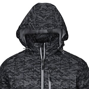 Additional Image 2 - a person wearing a hoodie and standing in front of a microphone