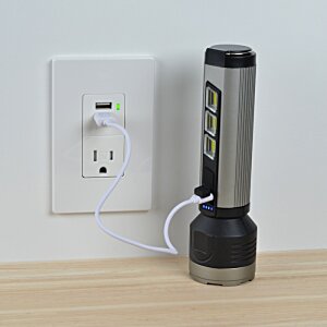 Additional Image 5 - a black and silver device with a cord plugged into a wall outlet