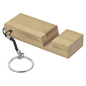 Additional Image 1 - a wooden block with a ring attached to it