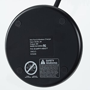 Additional Image 7 - a black circular object with a handle