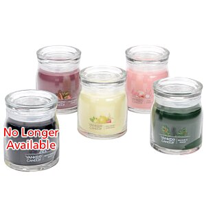 Additional Image 2 - a group of candles in glass containers