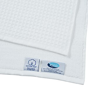 Additional Image 2 - a white paper with a blue tag