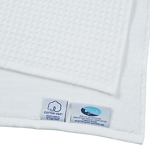 Additional Image 2 - a white paper with a blue tag