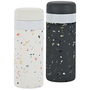 Additional Image 2 - a couple of bottles with black and white speckled substance