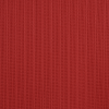 a red wall with vertical lines