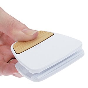 Additional Image 1 - a person holding a white object