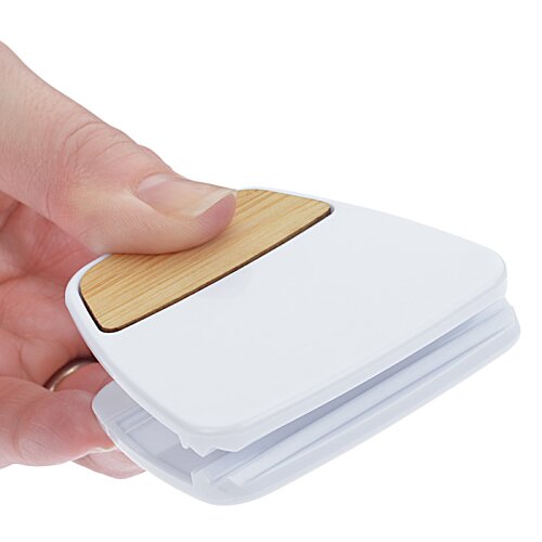 Additional Image 1 - a person holding a white object