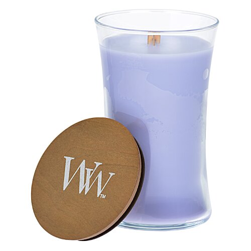 Additional Image 1 - a glass of purple candle next to a brown circle