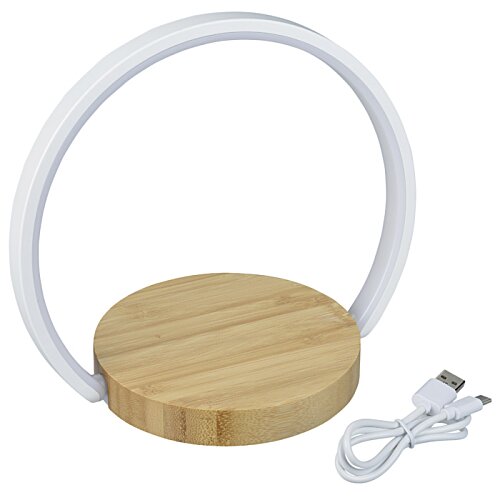 Additional Image 1 - a round wooden object with a white cord