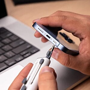 Additional Image 3 - a person holding a phone