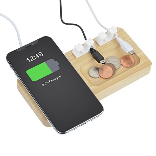 Additional Image 3 - a phone charging on a charging station