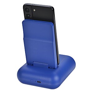 Additional Image 1 - a cell phone in a blue charging device