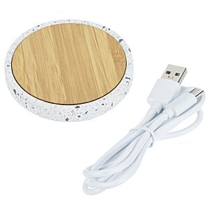 Additional Image 1 - a round wooden object with a cord