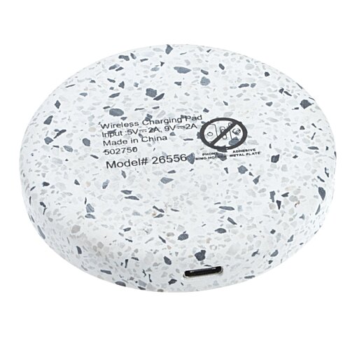 Additional Image 4 - a white round object with black speckled spots