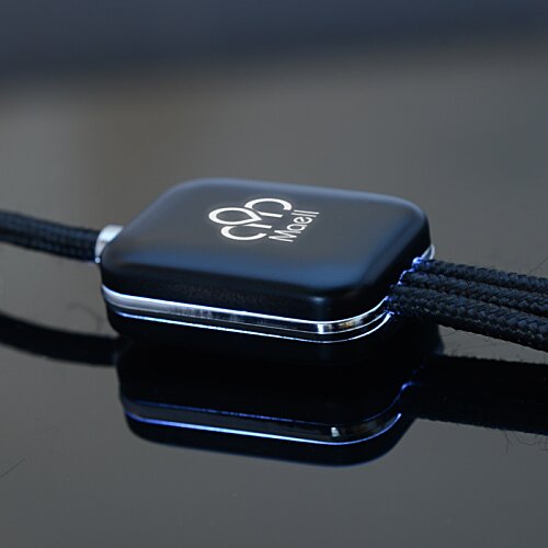 Additional Image 4 - a black square object with a black cord