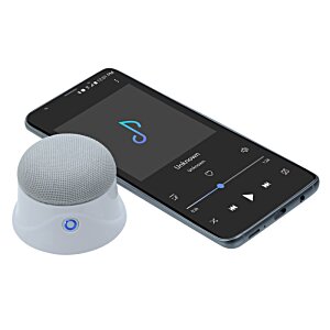 Additional Image 6 - a black and white device with a round button