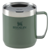 a green and silver coffee mug