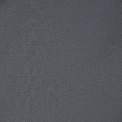 a white surface with black spots