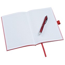 a pen on a book