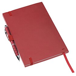 a red notebook with a red handle