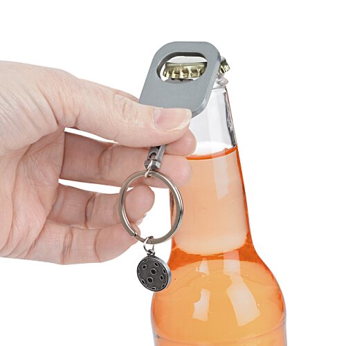 Additional Image 3 - a hand holding a bottle of beer