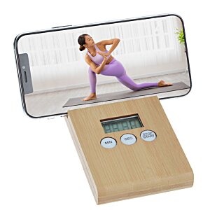 Additional Image 3 - a woman in purple yoga outfit on a scale