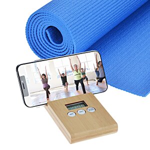 Additional Image 4 - a blue yoga mat and a cellphone