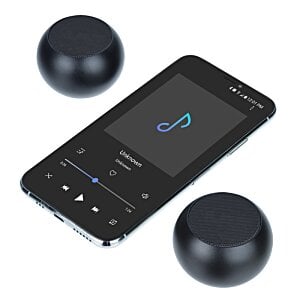 Additional Image 4 - a black cell phone and two round black objects