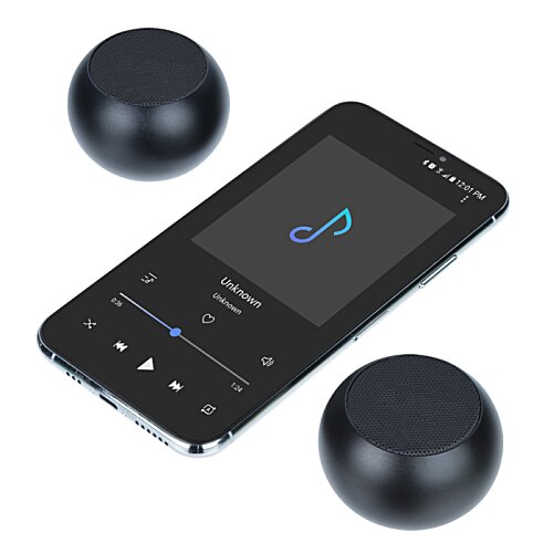 Additional Image 4 - a black cell phone and two round black objects
