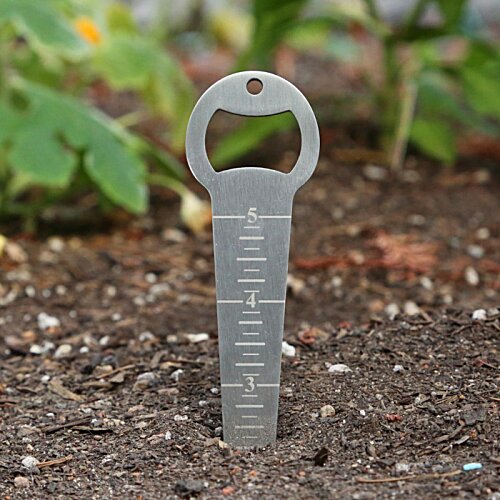 Additional Image 2 - a plastic spout in the dirt