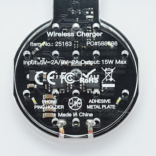 Additional Image 3 - a black circular object with many small buttons