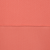 a close up of a pink surface