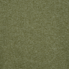 a green surface with white spots