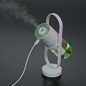 Additional Image 6 - a white and green device with a wire