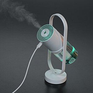 Additional Image 9 - a white and green device with a wire