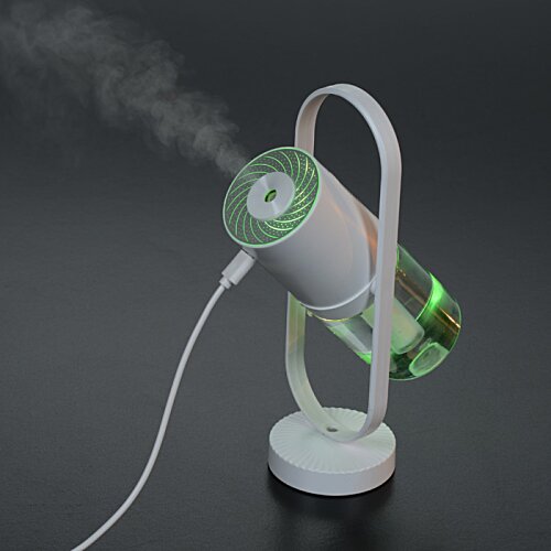 Additional Image 6 - a white and green device with a wire